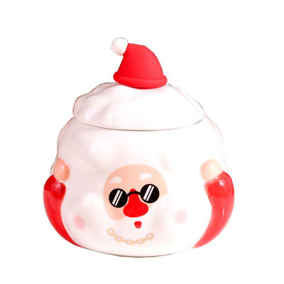 カスタマイズされたロゴ 蓋付きのセラミックカップ 可愛いクリスマススノーマンデザイン 3色