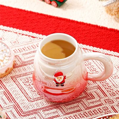 クリスマスサンタクロース 陶器のカップ ハンドル クリエイティブな漫画デザイン 2色