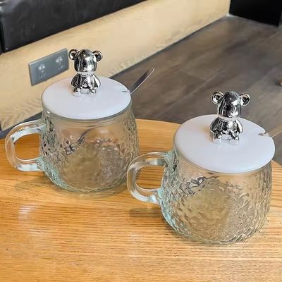 手柄カバーと蓋付きの朝食カップ 透明ガラスコーヒーカップ 12.5*13*8cm