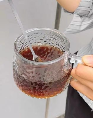 手柄カバーと蓋付きの朝食カップ 透明ガラスコーヒーカップ 12.5*13*8cm
